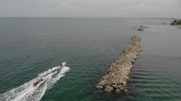 Colombia beach. people in boat having fun