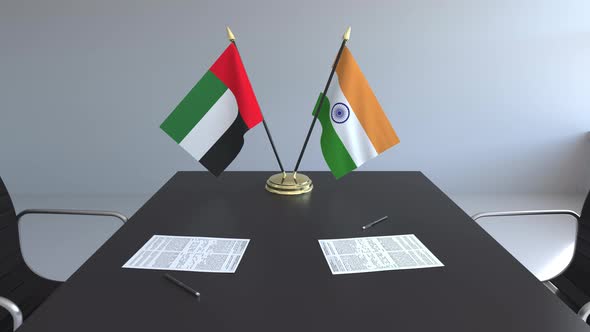 Flags of the United Arab Emirates and India on the Table alt