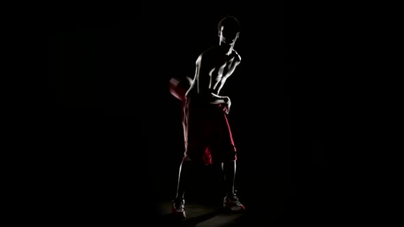 Man Play Basketball Isolated on Black