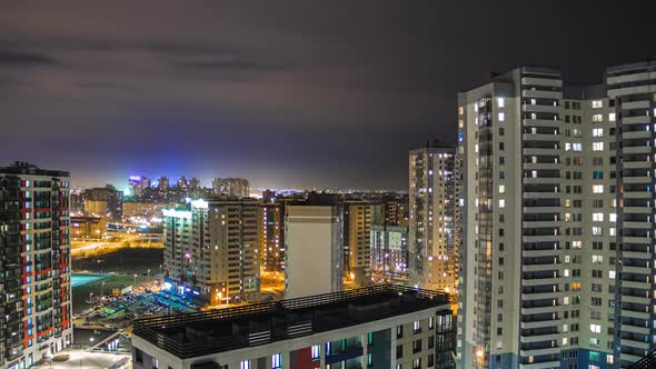 residential buildings at night. timelapse of the night city. living quarters, apartments