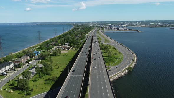 A steady flow of light traffic moves across the elevated Burlington Skyway, Hamilton, Ontario, Canad