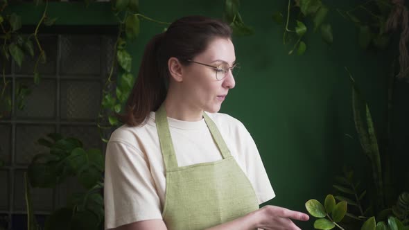 Professional Female Gardener Talks About Caring for Plants