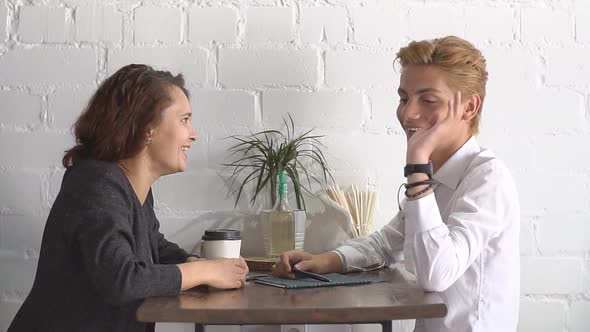 Business Lunch in a Cafe. The Meeting of Two Business