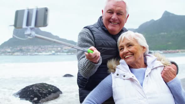 Senior couple taking a selfie from selfie stick