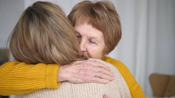 Grandmother Hugging Granddaughter. Love, Care, Family Values, Generation