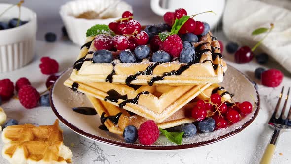 Sweet belgian waffles with berry