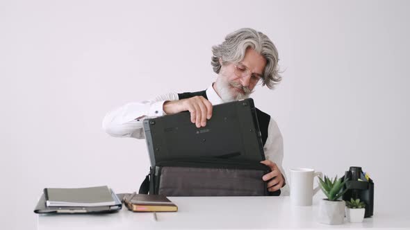 Hippie Businessman Working at the Office with Laptop