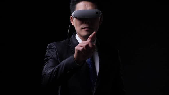 Business man wearing vr glasses and touching.