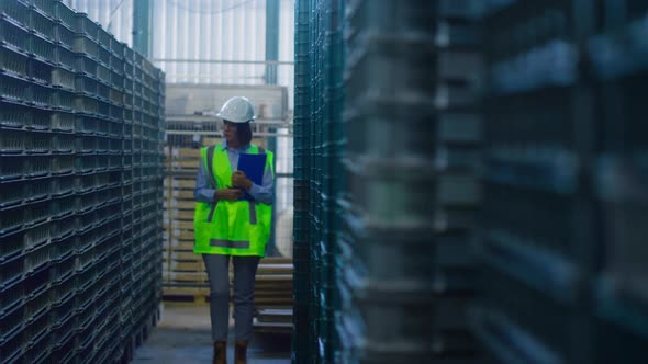 Storage Woman Worker Noting Delivery Details Checking Shipment Pallets Thinking