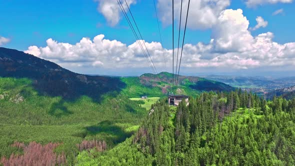 Travel by cable car from Kasprowy Wierch in Tatra mountain, Poland