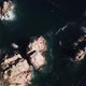 Flying above a kayak between mediterranean rocks, waves and seagulls on a sunny day - VideoHive Item for Sale