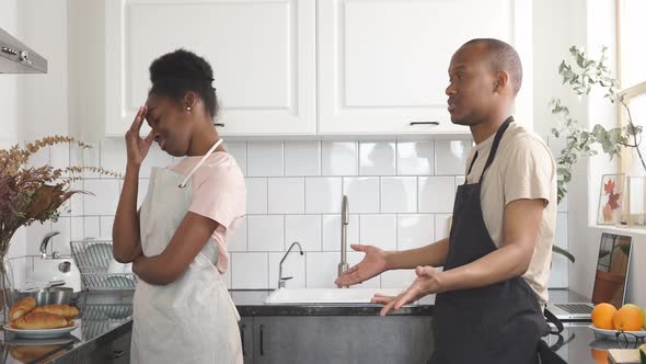 African American Couple Have Quarrel in the Kitchen