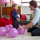 Father and son playing with balloons - VideoHive Item for Sale