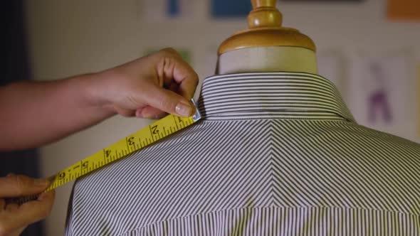 Tailor Measuring Width Of Shoulders 20