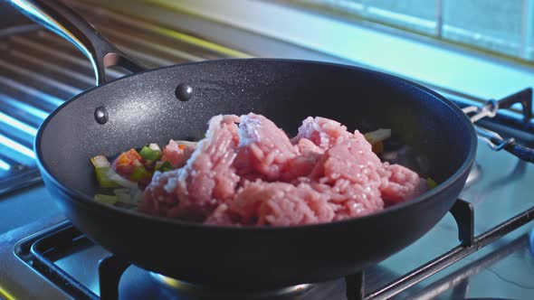 Bell Pepper And Onion Cooking In A Pan Then Add Fresh Ground Turkey Meat. Chili Con Carne Recipe. cl