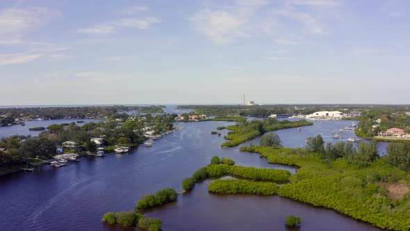 Forward Aerial of Boats Docked at Waterfront Houses on Bay in New Port Richey