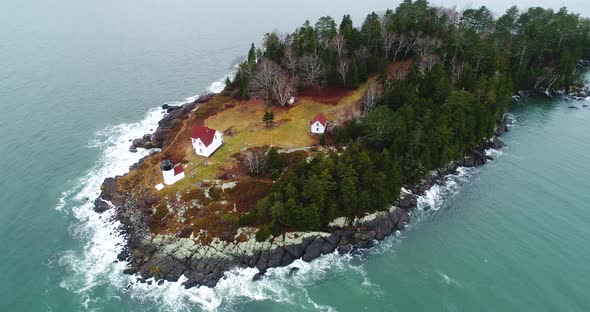 Aerial view Curtis island lighthouse Camden Maine USA with 180” turn