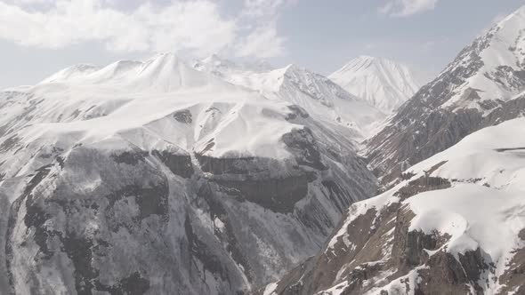 Gudauri, Georgia - April 12, 2021: Aerial view of Russia–Georgia Friendship Monument