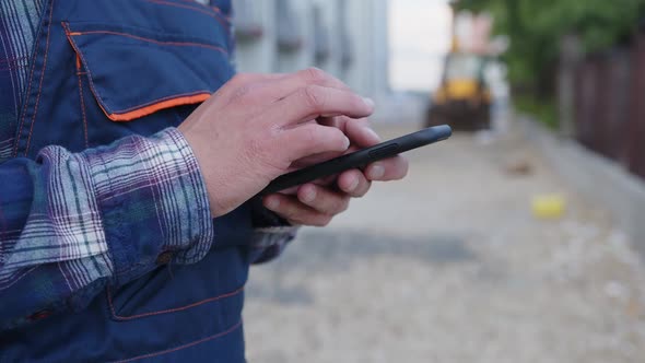 Close Up Man's Hands That Hold Phone