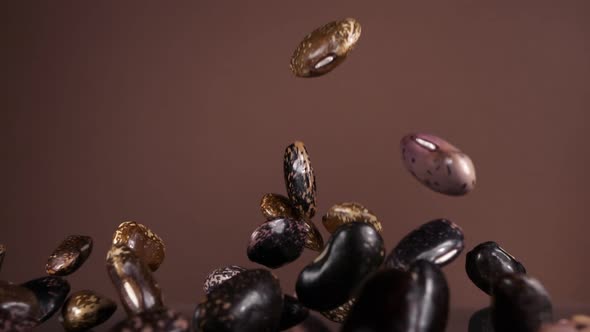 Falling Down Bean Beans on a Brown Background