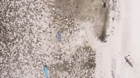 Vertical Video of Low Tide in the Ocean Near the Coast of Zanzibar Tanzania Aerial View