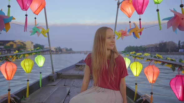 A Young Woman Tourist Visits an Ancient Town of Hoi An in the Central Part of Vietnam