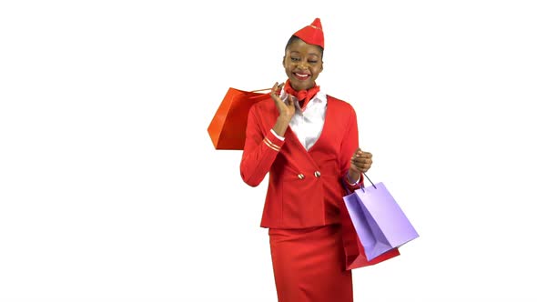 Afro American Girl Comes with Shopping Bags She's a Flight Attendant. Alpha Channel