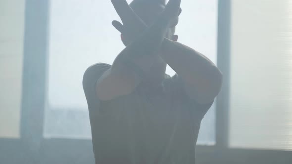 Portrait of Young Skillful Hip-hop Male Dancer Performing in Front of Camera