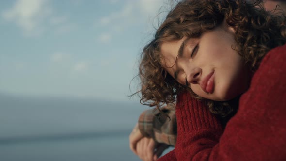 Closeup Glamour Girl Sitting on Sea Beach