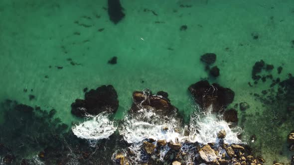 Aerial Panoramic View of Seascape with Crystal Clear Azure Sea and Rocky Shores