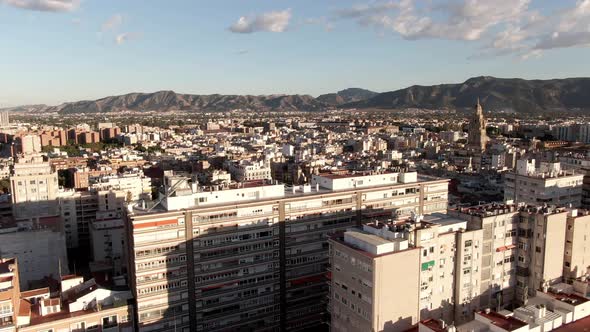 Aerial view panning across Murcia City with the Cathedral of Saint Mary