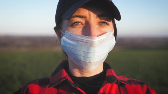 Girl with Medical Mask To Protect Her From Virus. Pandemic Coronavirus Concept.