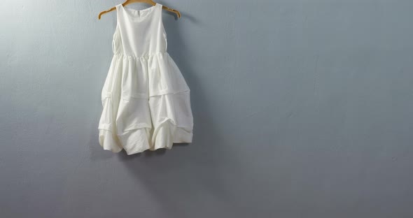 Dress hanging on hook 4k