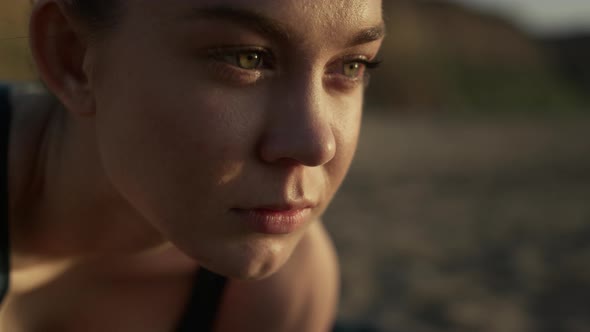 Closeup of Attractive Woman Face with Confident Gaze Into Distance Outdoors