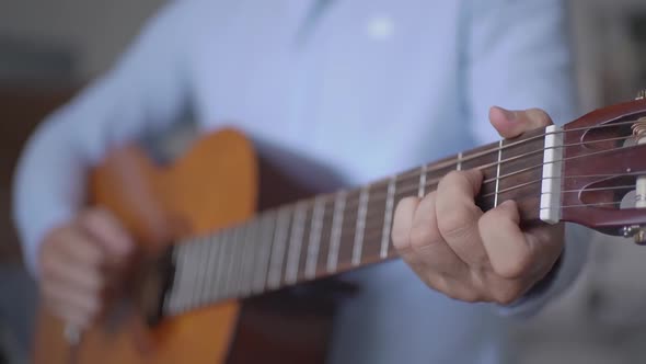 Man Playing Guitar