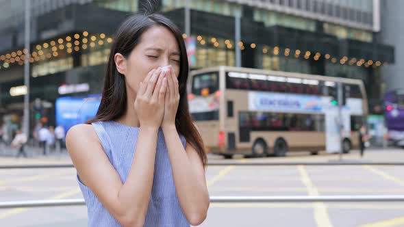 Woman feeling sick at outdoor of Hong Kong