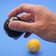 A man holds a magic billiard ball with the number 8  in his hand. - VideoHive Item for Sale
