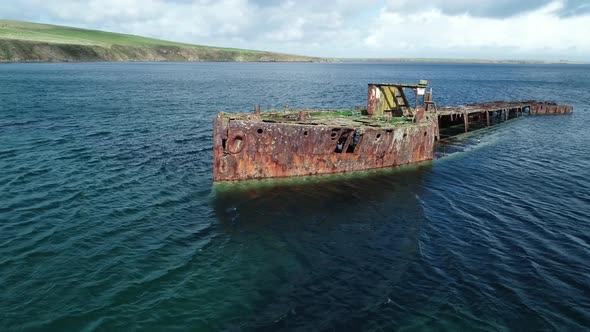 Aerial footage of the Wreck of Juniata, an old abandoned ship at Inganess Bay on the mainland of Ork