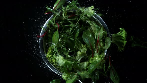 Super Slow Motion Shot of Flying and Rotating Fresh Cuts of Colorful Vegetables at 1000Fps.