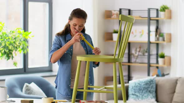 Woman with Ruler Measuring Chair for Renovation