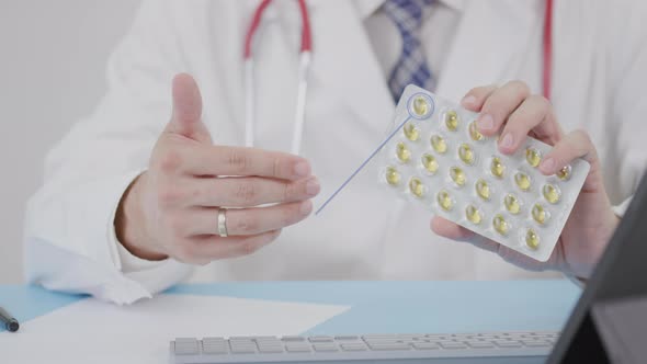 New Product Blister Pack with Capsules in Doctor's Hand