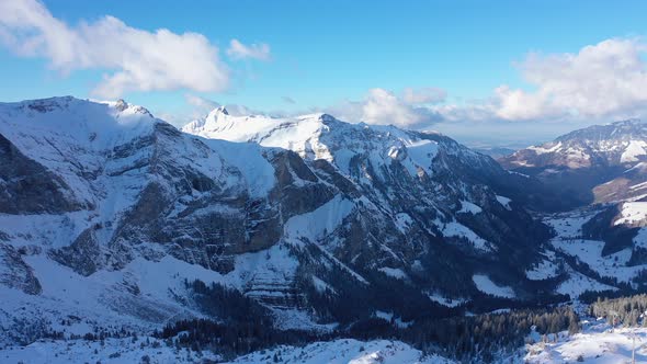Beautiful Sunny Winter´s Day in the Alps with Snow Capped Mountains  Aerial Drone Footage