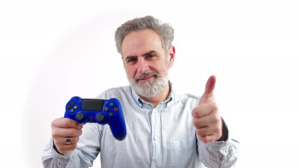 Middle Aged Man Holding the Gamepad Controller  Isolated on White Background