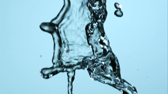 Water pouring and splashing in ultra slow motion 1500fps on a reflective surface - WATER POURS