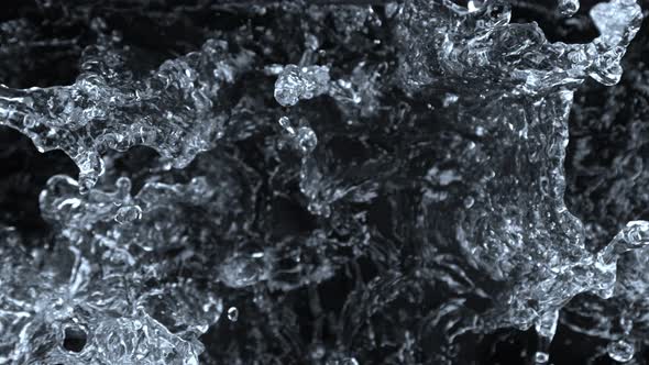 Super Slow Motion Shot of Splashing Water Isolated on Black Background at 1000 Fps
