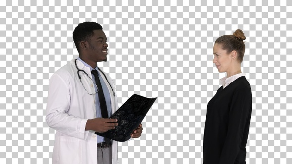 Physician showing a patient the X-ray results Then patient leaves