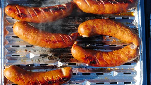 Sausages Grilling on Gas Grill
