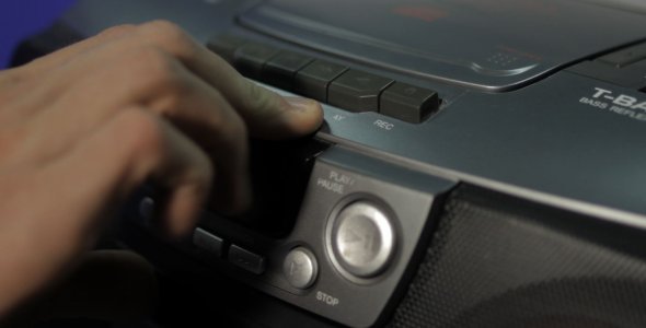Inserting an Audio Tape into the Player