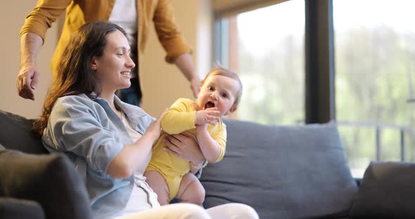 Video Portrait of a Happy Caucasian Family with a Baby