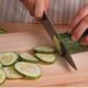 Chopping Cabbage Vegetables on a Glass Board